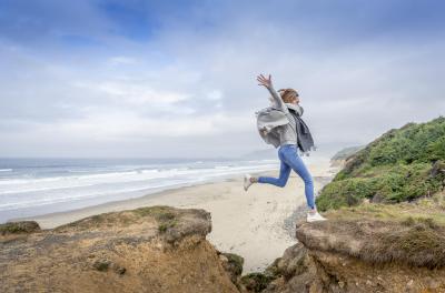 Woman Having Fun At The Beach